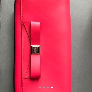 Kate spade clutch, bright coral color like new!!
